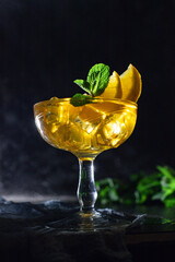 alcoholic beverage cocktail drink ice cube lemon and mint portion on the table meal outdoor top view copy space for text food background rustic image