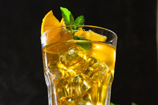alcoholic beverage cocktail drink ice cube lemon and mint portion on the table meal outdoor top view copy space for text food background rustic image