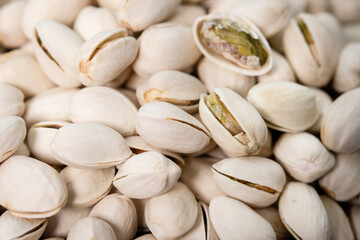 pistachios texture and background . tasty pistachios as background,as pistachios texture. flat lay. (selective focus; close-up shot).