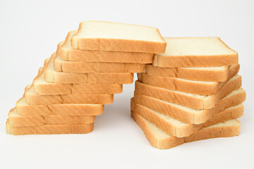 Two stacks of wheat toast bread isolated on white