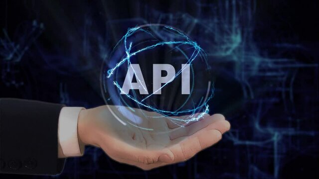 Painted hand shows concept text API hologram on his hand. Drawn man in business suit with future technology screen and modern cosmic background