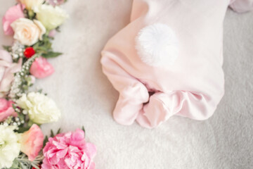 The first month of a baby's life. Newborn baby girl dressed as a hare. Sweet newborn baby. First photo session of the baby. One month old baby.