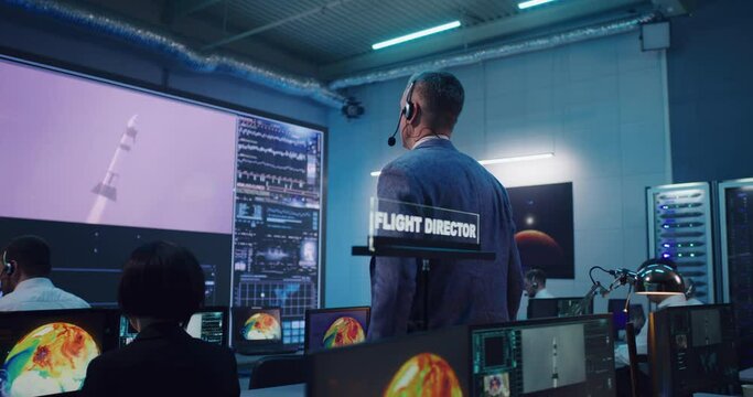 Boss giving commands during rocket launch