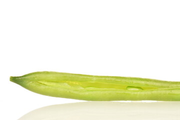 Pod of bright green, organic, natural, ripe beans on a white background.