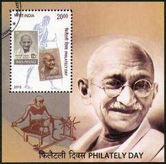 INDIA - 2013: shows portrait of  Mahatma Mohandas Karamchand Gandhi (1869-1948), Philately day, 2013 - obrazy, fototapety, plakaty