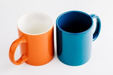 Colorful cups on a white background.