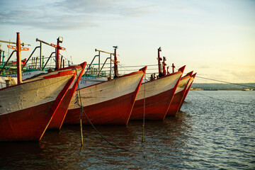 Fototapeta na wymiar Fisherman's boat resting on the harbor.