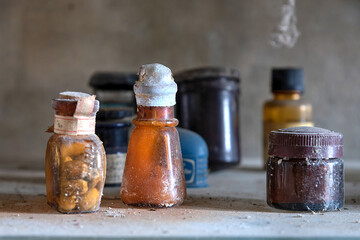 November 2020, Italy. Old medicine bottles in the cabinet of an abandoned dental office in Northern Italy. Urbex in Italy