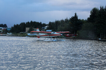 Obraz premium Seaplane at takeoff, Alaska