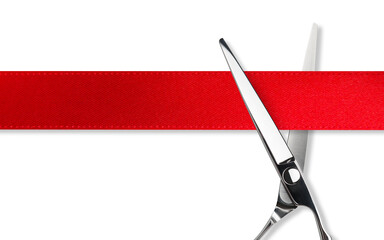 Scissors Grand opening. Top view of scissors cutting red silk ribbon against white isolated background with copy space. Silver stainless metal scissors or shears. - obrazy, fototapety, plakaty