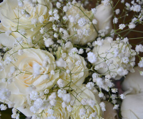 white wedding bouquet on a black background. beautiful floral composition. 