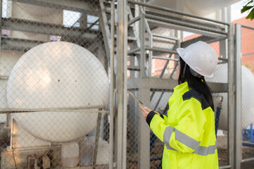 Engineers work place to keep liquid helium,preventive maintenance schedule checking,Thailand people