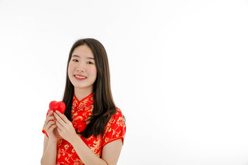 Asian young pretty woman wearing  red Chinese Traditional dress for New year celebration and Valentine