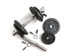 Obraz na płótnie Canvas Set of metal dumbbells isolated from the background