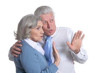 Portrait of surprised senior couple