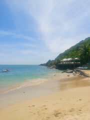 Beautiful azure beach in Bali. Summer vacation in a tropical beach