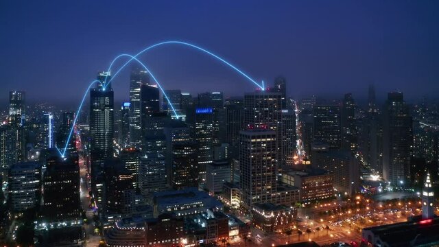 Aerial view of San Francisco skyline at night with digital network connection lines. Smart city lights with digital transformation of information. Information Arches forming global network, 4k footage