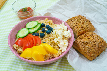 Bulgur porridge with vegetables and sauce top view