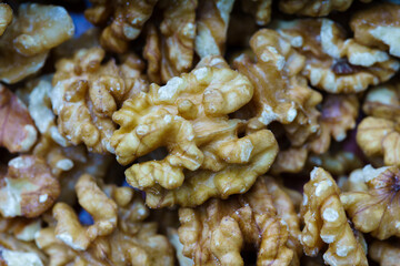 Close-up of a bunch of walnuts, with out of focus background. Horizontal view.