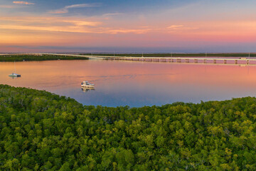 Naklejka premium sunset over the river