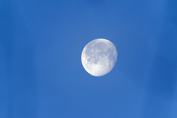 Moon in the sky at sunrise