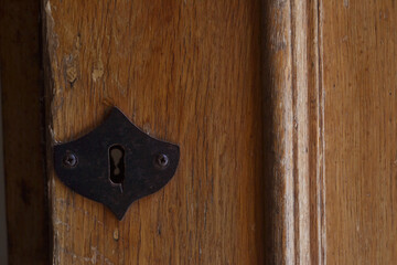 fragment of an old door. fragment of an old door. Rusty keyhole fragment of an old door. Rusty keyhole 