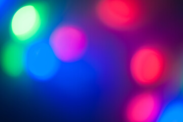 The artistic abstract background. Colorful blurred holiday lights