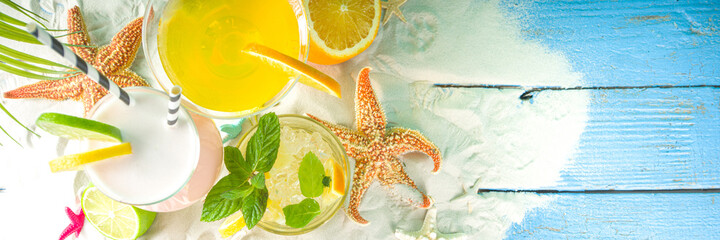 Summer tropical sea holiday vacation concept. Three various glass with summer cold cocktail drinks,...