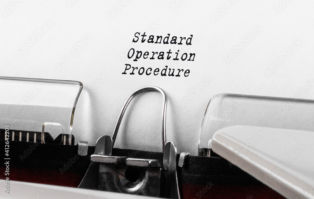 Poster text standard operation procedure typed on retro typewriter