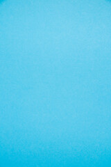 Background with copy space. Colored blue paper or cardboard with space for text, vertical format