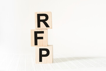 a word RFP on wooden cubes. business concept. business and Finance