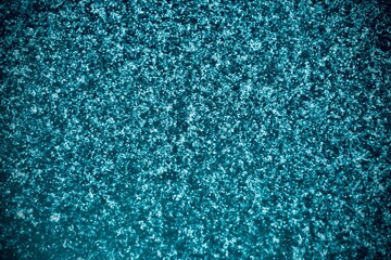 Snow on ice on a winter lake.