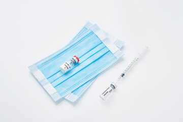 Coronavirus prevention vaccine, medical protective mask isolated on white background. Disposable surgical face mask cover mouth and nose. Healthcare medical Coronavirus quarantine.