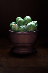 Brussels sprouts in a wooden bowl. 
