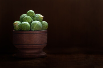 Brussels sprouts in a wooden bowl. 