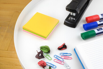 Office supplies on white table