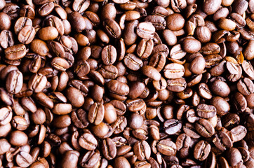 Roasted coffee beans background. Top view. 