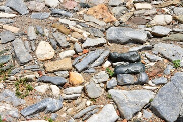 Medieval destroyed stones.  Old historical bricks.  Ancient cobblestone path. Destroyed building in Ayasuluk Castle, Turkey. Selective focus. Abstract grunge background 