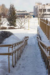a descent for the disabled covered with snow