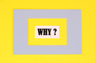 question why in a blue frame on a yellow background. motivation and inspiration concept