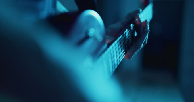 Guitarist playing electric guitar on stage