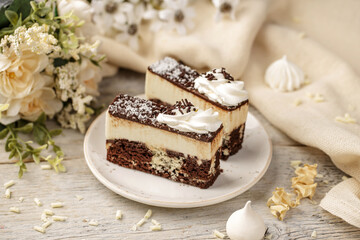 Chocolate cake with cocos on a wooden background