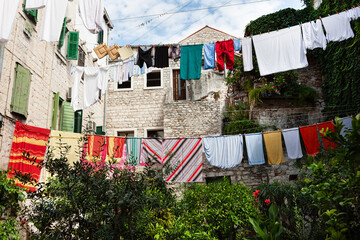 Drying washed laundry on the streets in the courtyard. High, clothes. Georgia, Tbilisi, Batumi, Kutaisi.