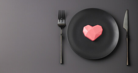 Creatine festive black table setting with pink hearts on a dark background. Valentine's Day, Wedding Day, Birthday, Women's Day and Mother's Day. Flat lay. Copy space.