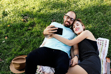 Photo of a couple taking a selfie