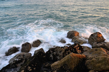 Colorful splash of waves close-up in the mediterranean sea. 