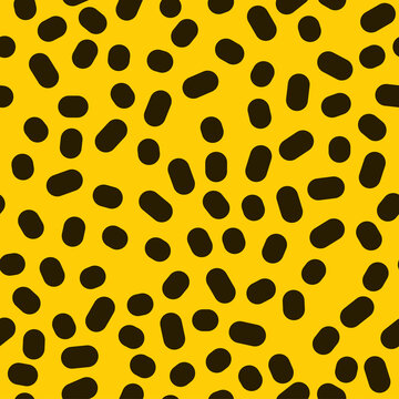 70s 80s 90s retro japanese fashion seamless pattern in yellow and black colors. Leopard texture ornament with big dots and ovals on yellow background. Vector endless fashion design.