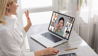 woman and team on laptop screen talking and discussion in video conference. Working from home,...