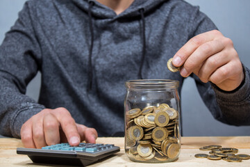 cumulative glass jar and calculator