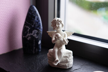 Protective angel in girl's bedroom.